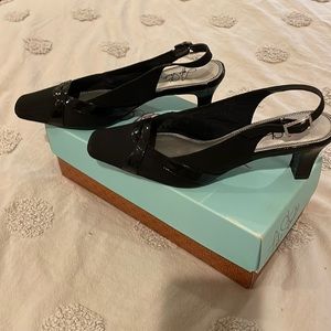Woman’s black dress shoe